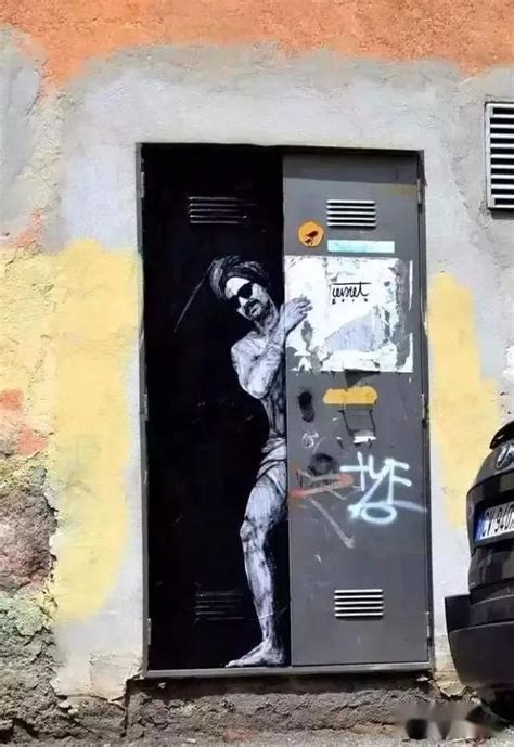 法国艺术家涂鸦墙被损